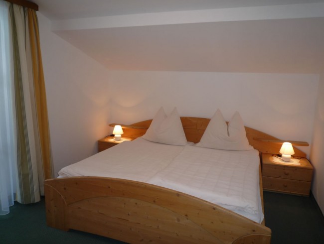 Schlafzimmer im Appartement A, Ferienwohnungen Wechselmaishof
